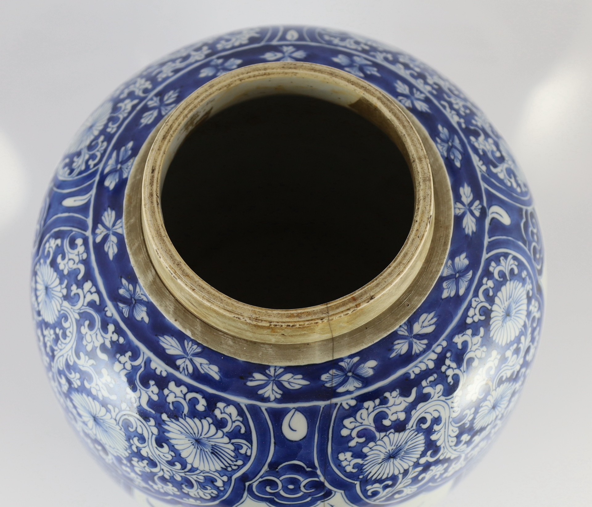 A large Chinese blue and white large ovoid jar, Kangxi period, 45cm high, cracked